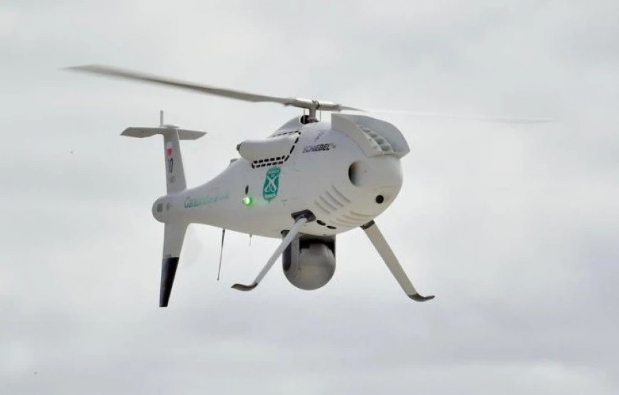 UAS VTOL Schiebel Camcopter S 100 número C 30 con el sistema TrakkaCam TC 300 en su exhibición aérea. Firma Ministerio del Interior y Seguridad Pública de Chile 002